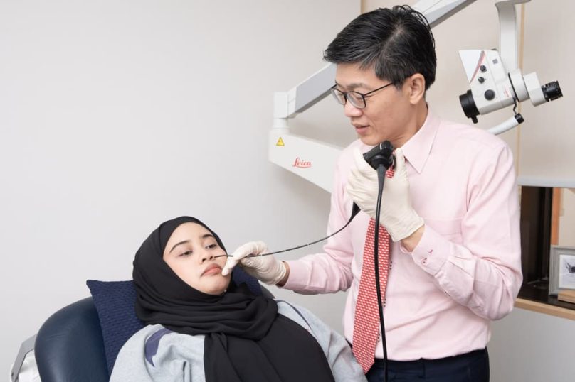 Sinus-specialist-performing-nasal-endoscopy