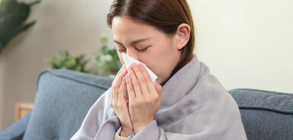 Woman-experiencing-nasal-congestion-and-sinus-discomfort Woman experiencing nasal congestion and sinus discomfort