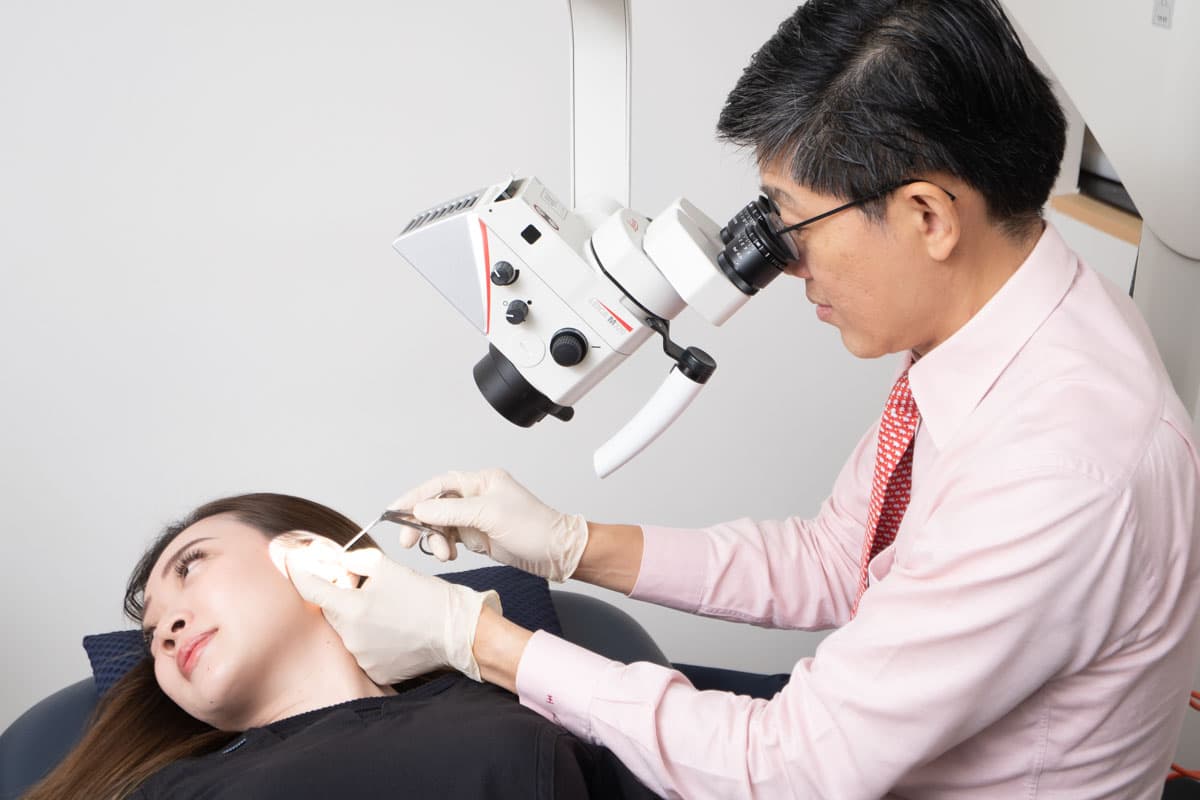 Dr Ong Yew Kwang patient ear examination